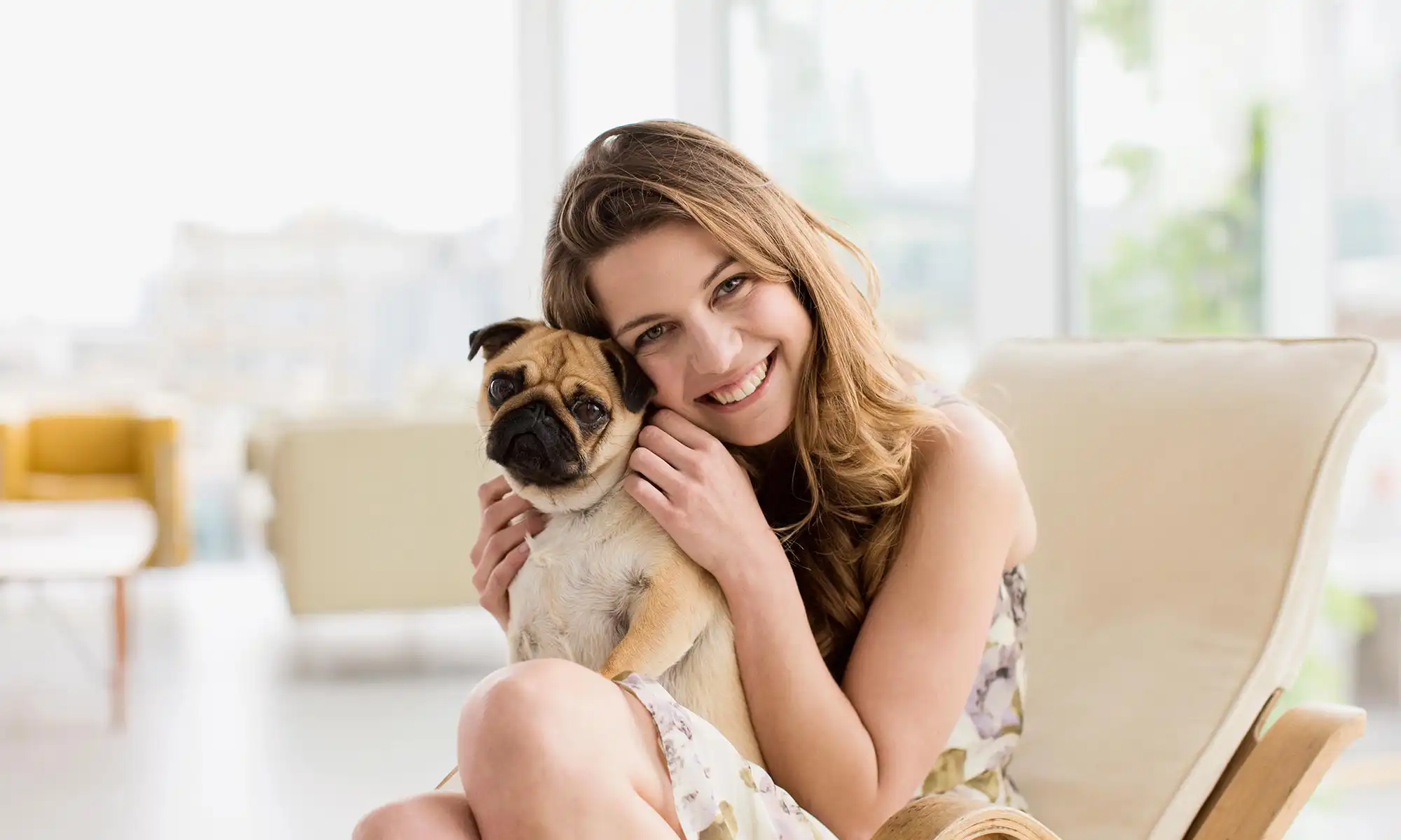 A woman with her pug
